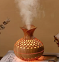 Mini humidificador de escritorio con diseño de flor de tres hojas